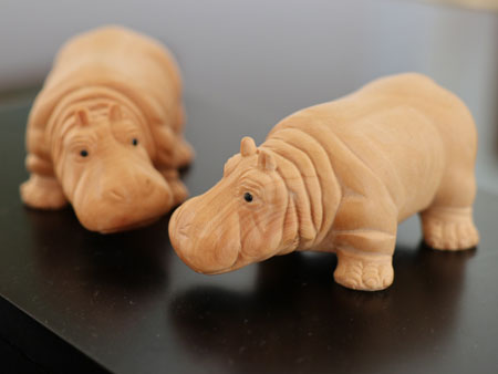 carved hippos