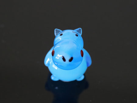 small glass hippo